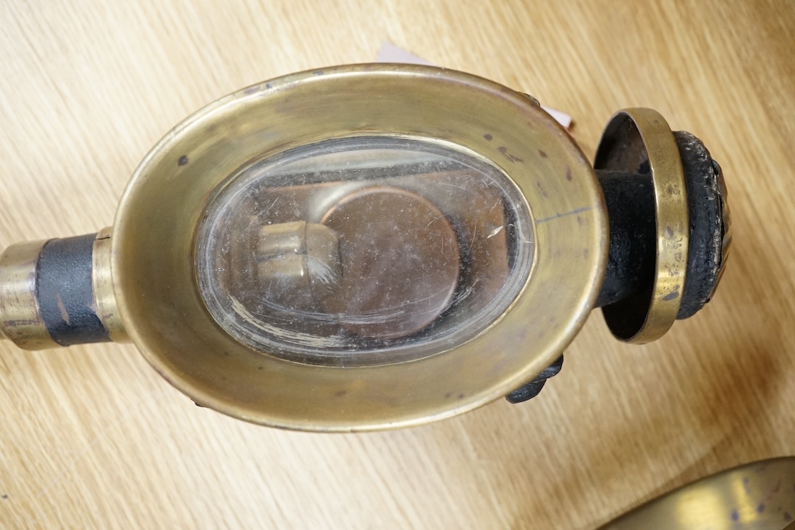 A pair of 19th century brass coaching lamps, 44cm high